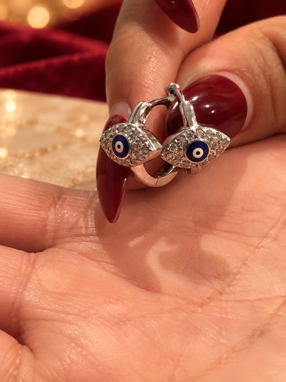 Blue Eye-Motif Earrings, Rochel Jewelry collection photograph