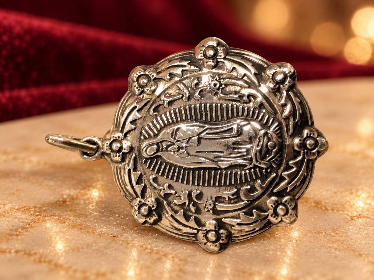 Oval Religious-Motif Pendant, Rochel Jewelry collection photograph